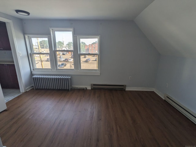 327 Center St, West Haven, CT 06516 - additional living space with a baseboard heating unit, radiator heating unit, lofted ceiling, and wood finished floors