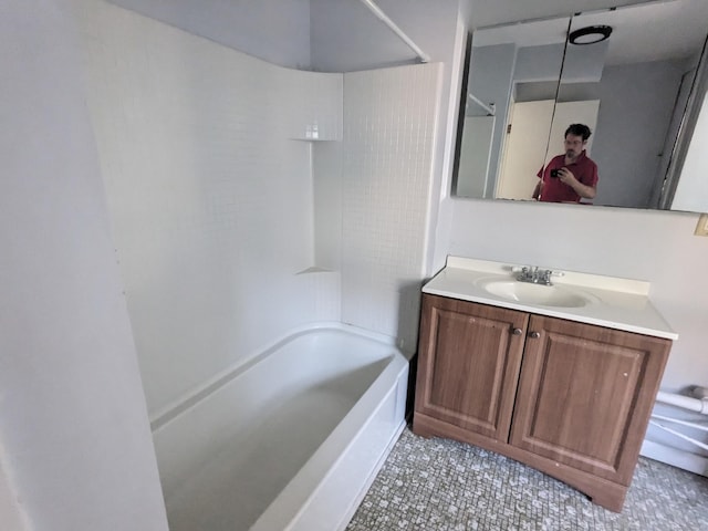 327 Center St, West Haven, CT 06516 - bathroom with tile patterned floors, washtub / shower combination, and vanity