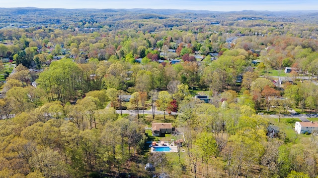 aerial view featuring a view of trees