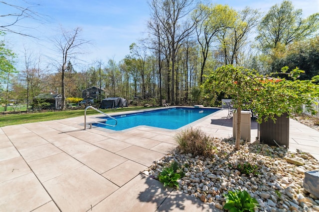 pool with a patio