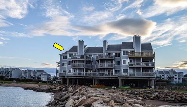 5 Mansfield Grove Rd Apt 342, East Haven, CT 06512 - view of building exterior featuring a water view