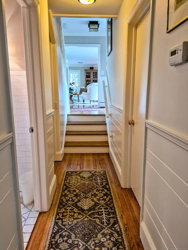 2 Ridgewood Dr, Danbury, CT 06811 - hallway featuring wood finished floors and a wainscoted wall