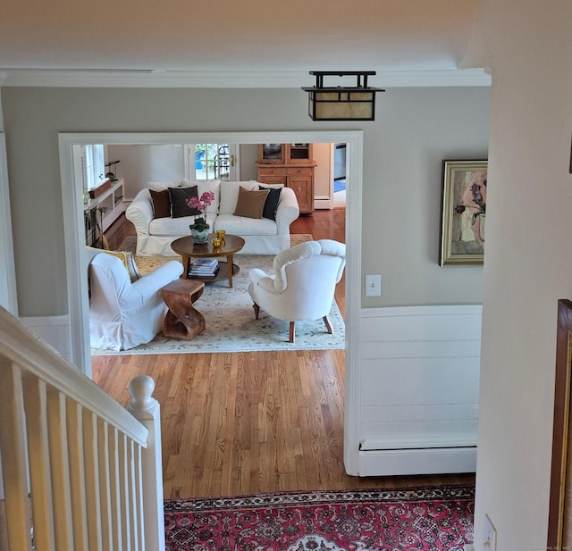 2 Ridgewood Dr, Danbury, CT 06811 - living area with wood finished floors, ornamental molding, and a baseboard radiator