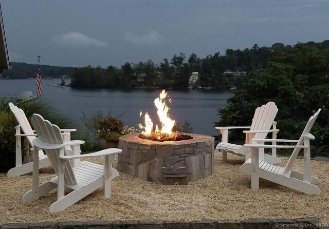 29 Old Neversink Rd, Danbury, CT 06811 - view of patio with a water view and a fire pit