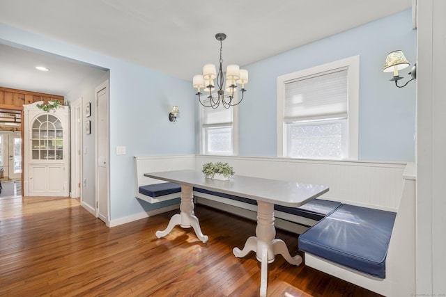 29 Old Neversink Rd, Danbury, CT 06811 - dining space featuring wainscoting, a notable chandelier, wood finished floors, and breakfast area