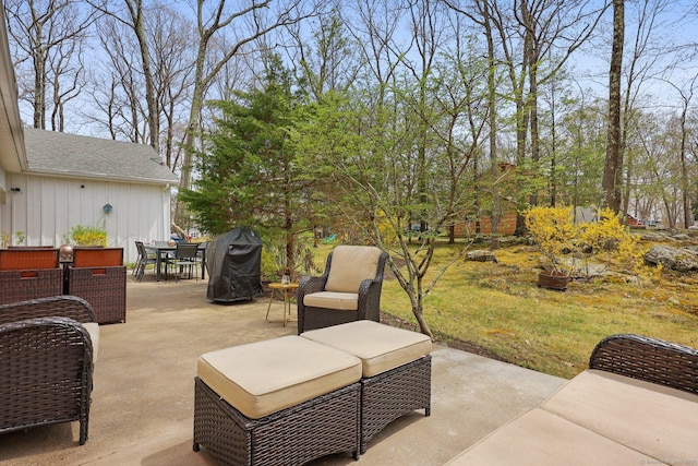 view of patio featuring area for grilling and outdoor dining area