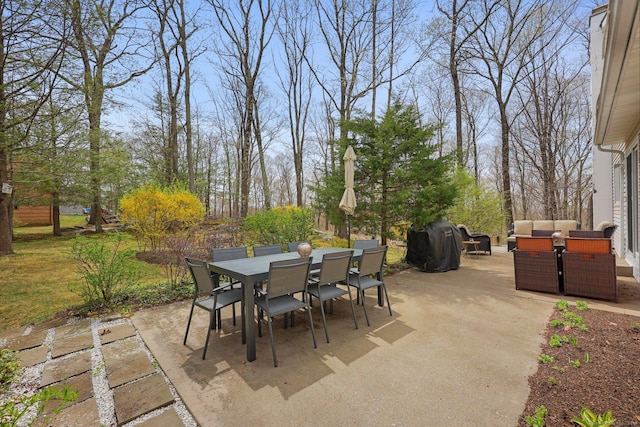 view of patio / terrace featuring an outdoor living space and outdoor dining area