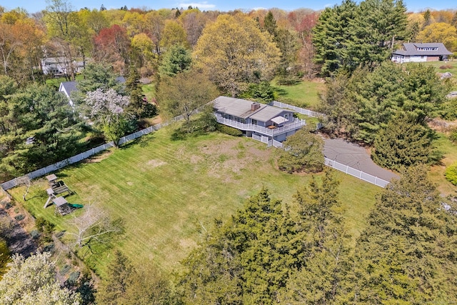 aerial view featuring a wooded view