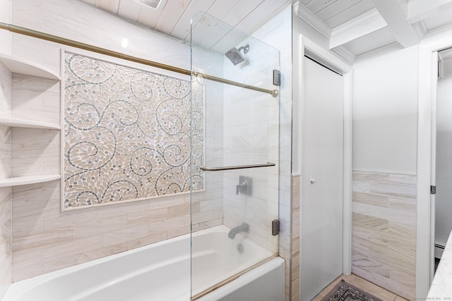 bathroom with bath / shower combo with glass door, ornamental molding, and tile walls