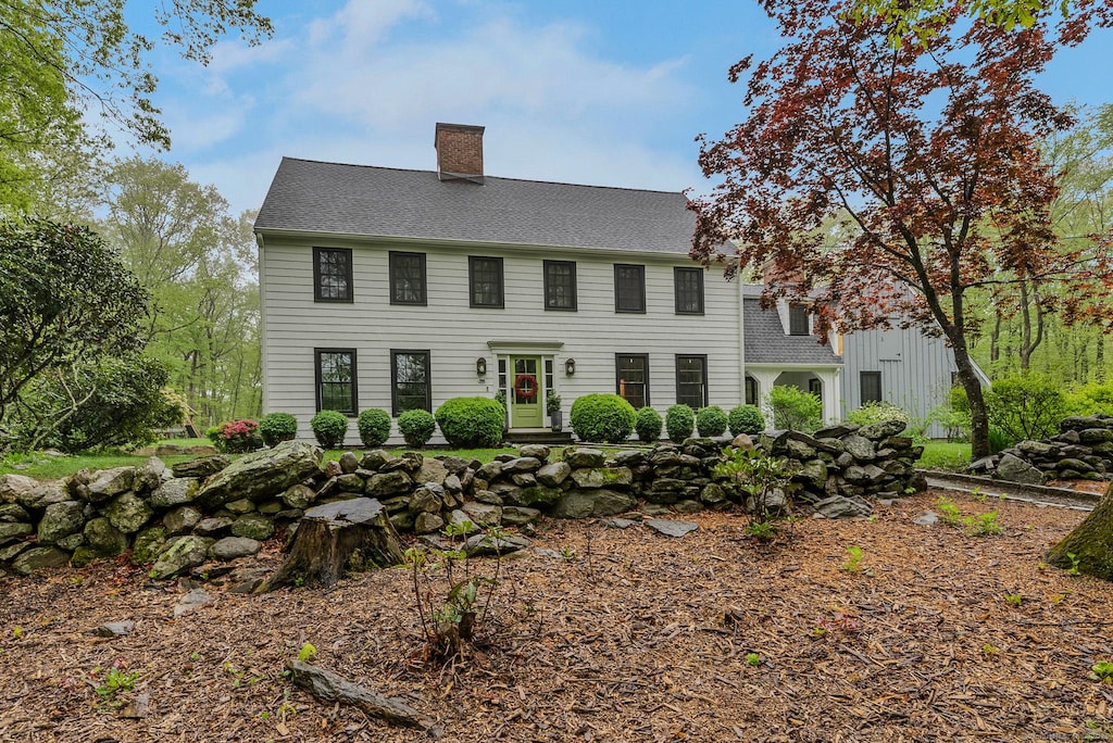 158 Mile Common Rd, Easton, CT 06612 - colonial home with a chimney and roof with shingles