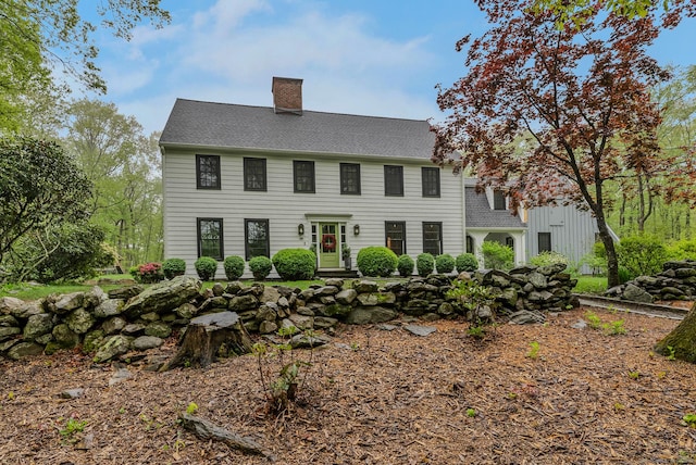 158 Mile Common Rd, Easton, CT 06612 - colonial home with a chimney and roof with shingles