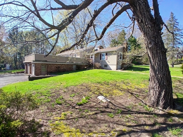 view of yard with an attached garage