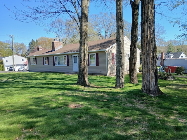 297 Whittemore Rd, Middlebury, CT 06762 - view of front of home featuring a front yard and a chimney