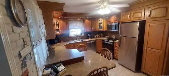 297 Whittemore Rd, Middlebury, CT 06762 - kitchen with appliances with stainless steel finishes, a sink, glass insert cabinets, a ceiling fan, and brown cabinetry