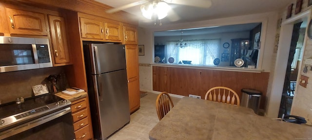 297 Whittemore Rd, Middlebury, CT 06762 - kitchen with appliances with stainless steel finishes, ceiling fan, brown cabinets, and light countertops