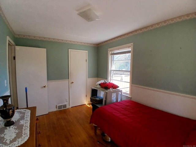 297 Whittemore Rd, Middlebury, CT 06762 - bedroom featuring a wainscoted wall and wood finished floors