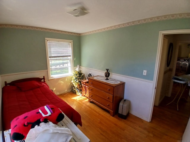 297 Whittemore Rd, Middlebury, CT 06762 - bedroom featuring wood finished floors and wainscoting