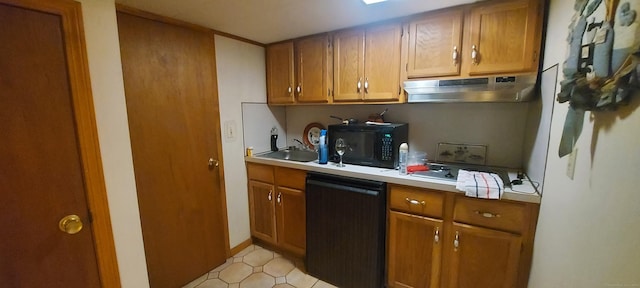 297 Whittemore Rd, Middlebury, CT 06762 - kitchen with under cabinet range hood, dishwasher, black microwave, brown cabinetry, and light countertops