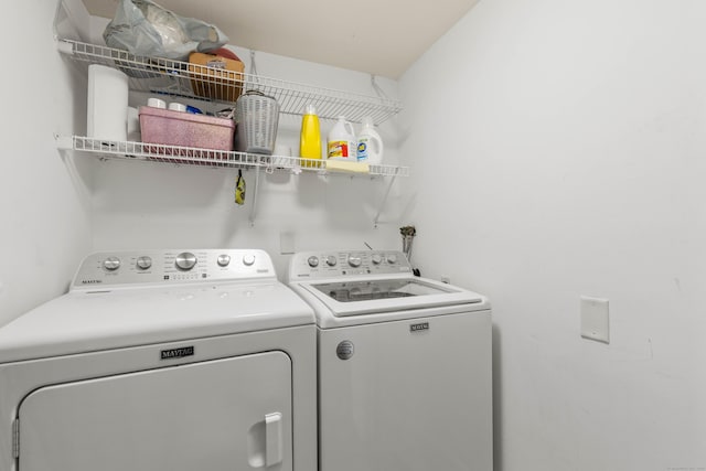 laundry area with laundry area and washer and dryer