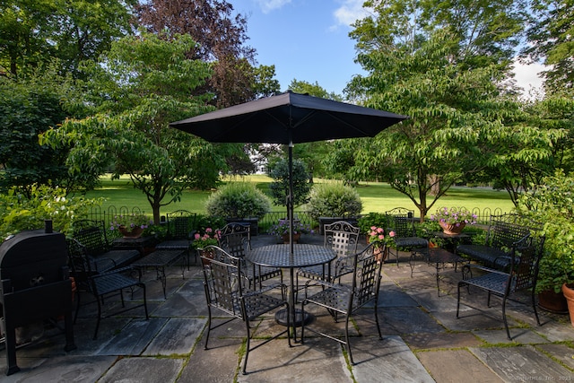 view of patio / terrace with fence and outdoor dining space