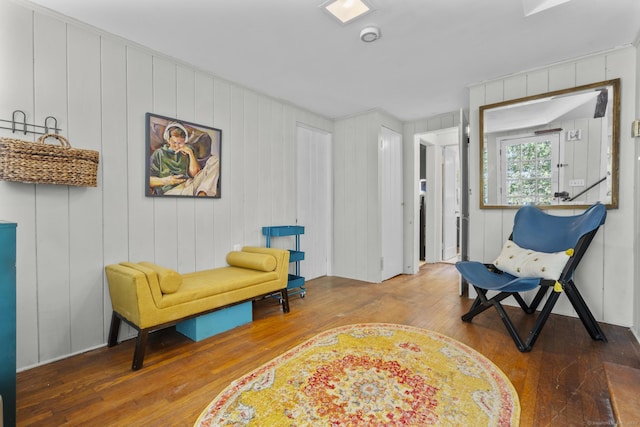 living area with wood finished floors