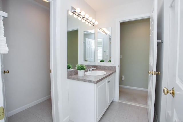 bathroom with vanity and tile patterned floors