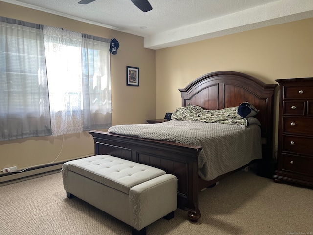 bedroom featuring ceiling fan, light carpet, and a textured ceiling