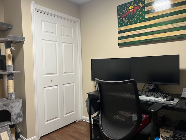 office featuring dark wood-style flooring and baseboards