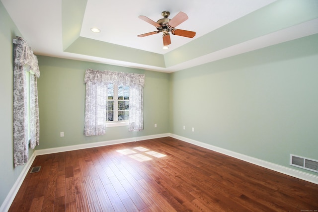 5 Marjories Way Unit 5, East Lyme, CT 06357 - empty room with a raised ceiling, dark wood-style flooring, a ceiling fan, baseboards, and recessed lighting