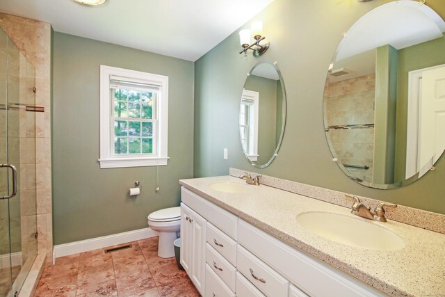 5 Marjories Way Unit 5, East Lyme, CT 06357 - full bath featuring a stall shower, toilet, baseboards, and double vanity