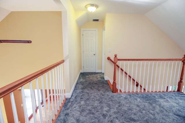 5 Marjories Way Unit 5, East Lyme, CT 06357 - hallway with carpet flooring, lofted ceiling, an upstairs landing, and baseboards