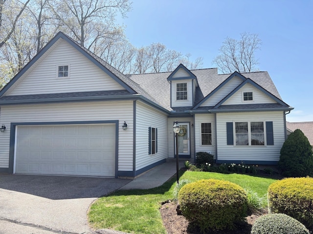 5 Marjories Way Unit 5, East Lyme, CT 06357 - view of front of house featuring asphalt driveway, a shingled roof, and an attached garage
