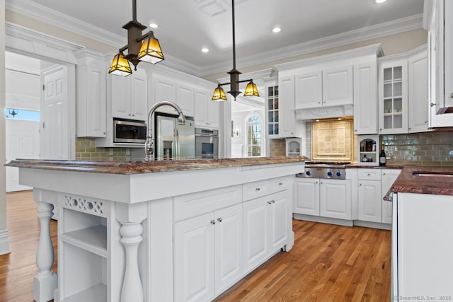 kitchen featuring stainless steel appliances, ornamental molding, open shelves, white cabinetry, and decorative backsplash