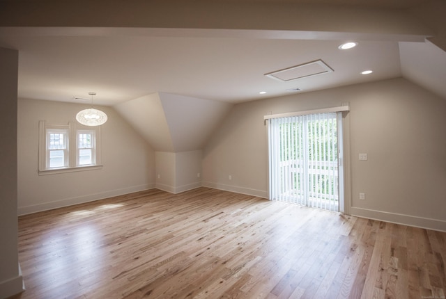 221 Broadway, Norwich, CT 06360 - additional living space featuring baseboards, recessed lighting, light wood-style flooring, and lofted ceiling