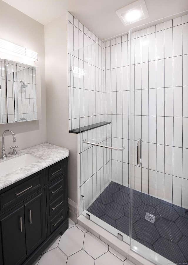 221 Broadway, Norwich, CT 06360 - full bath featuring tile patterned floors, a shower stall, and vanity