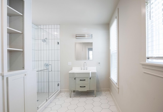 221 Broadway, Norwich, CT 06360 - bathroom featuring vanity, tile patterned floors, baseboards, and a stall shower