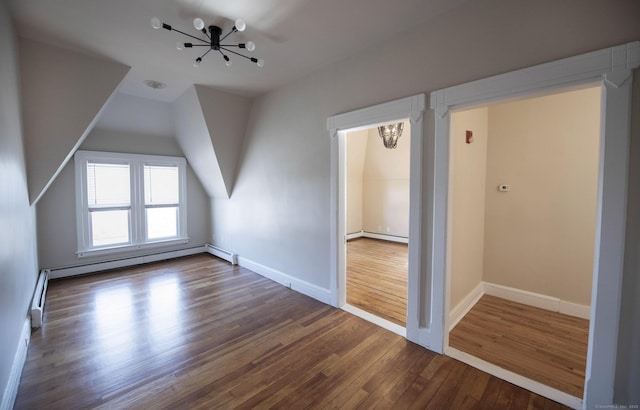 221 Broadway, Norwich, CT 06360 - additional living space featuring baseboards, a notable chandelier, hardwood / wood-style flooring, and a baseboard radiator