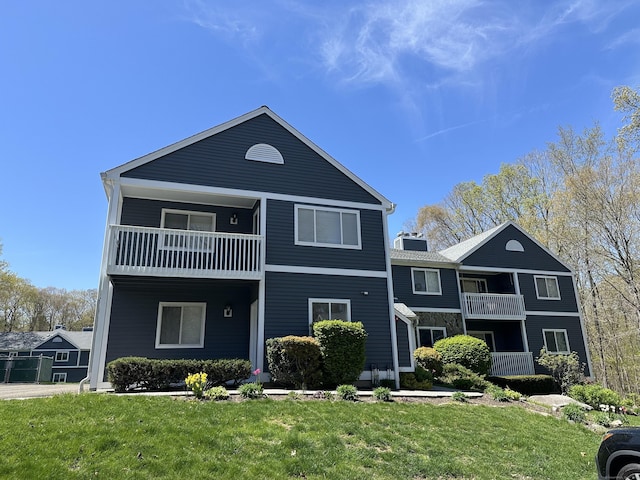 103D Wendover Dr Unit D, Monroe, CT 06468 - view of front of house with a balcony and a front lawn