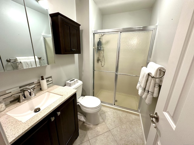 103D Wendover Dr Unit D, Monroe, CT 06468 - bathroom featuring tile patterned floors, a shower stall, vanity, and toilet