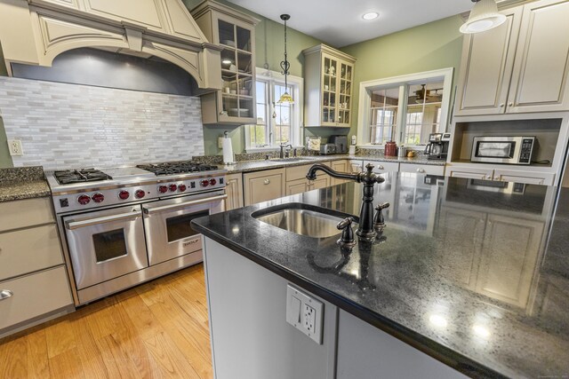 267 Chase Rd, Thompson, CT 06277 - kitchen with stainless steel appliances, a sink, pendant lighting, tasteful backsplash, and recessed lighting