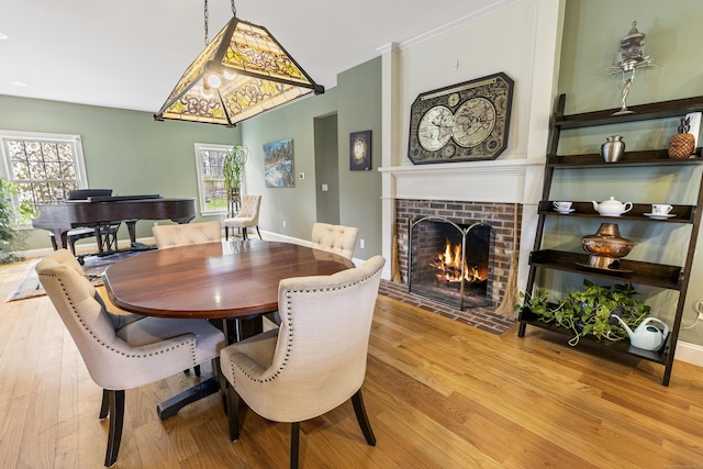 267 Chase Rd, Thompson, CT 06277 - dining room featuring wood finished floors and a fireplace