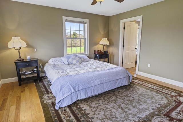 267 Chase Rd, Thompson, CT 06277 - bedroom with wood finished floors, baseboards, and a ceiling fan