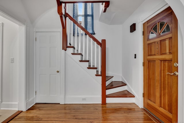 291 E St, New Britain, CT 06051 - foyer entrance with stairway, light wood-style flooring, and baseboards