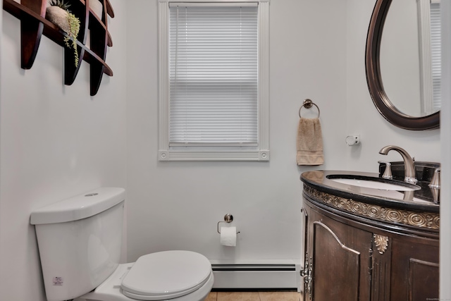 291 E St, New Britain, CT 06051 - bathroom featuring toilet, a baseboard radiator, tile patterned floors, and vanity