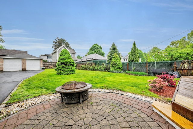 291 E St, New Britain, CT 06051 - view of patio featuring an outdoor fire pit and fence private yard