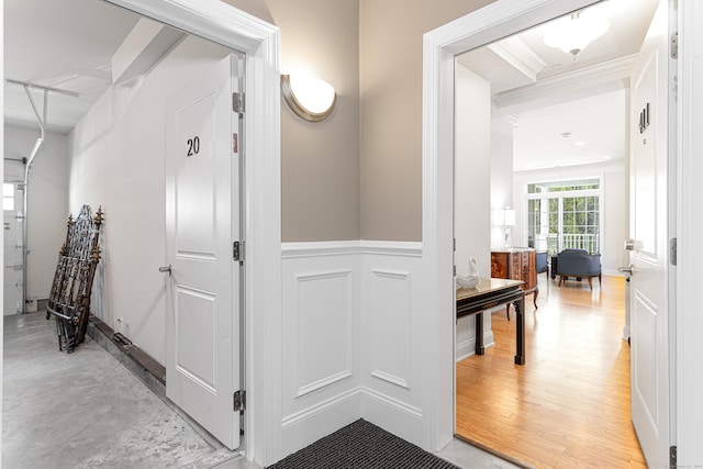 411 Brookside Ct Unit 411, Newtown, CT 06470 - corridor with wainscoting and ornamental molding