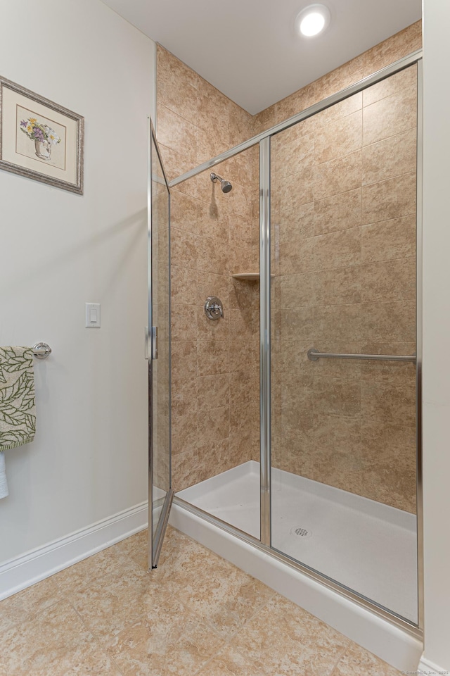 411 Brookside Ct Unit 411, Newtown, CT 06470 - bathroom with a shower stall, baseboards, and tile patterned flooring