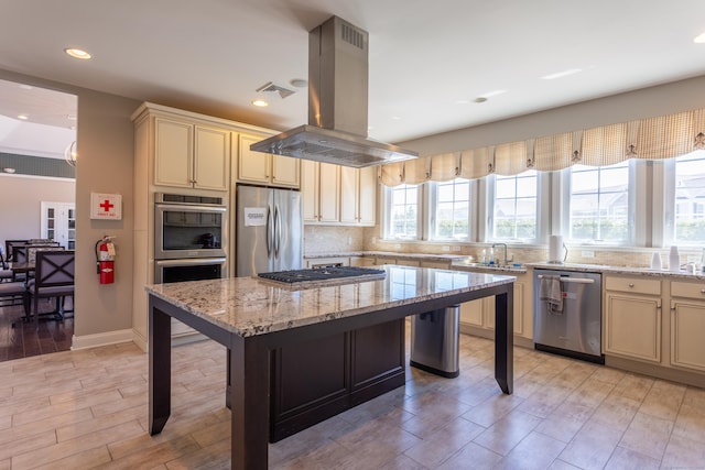 411 Brookside Ct Unit 411, Newtown, CT 06470 - kitchen with stainless steel appliances, island exhaust hood, light wood-type flooring, a kitchen breakfast bar, and recessed lighting