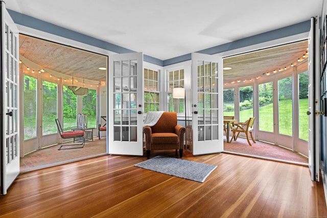 34 W Ave, Essex, CT 06426 - doorway with french doors and hardwood / wood-style floors