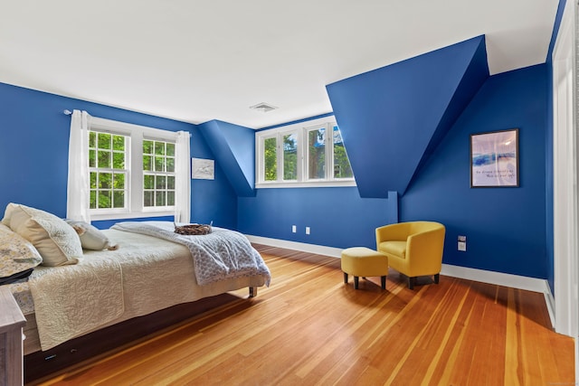 34 W Ave, Essex, CT 06426 - bedroom featuring wood finished floors and vaulted ceiling
